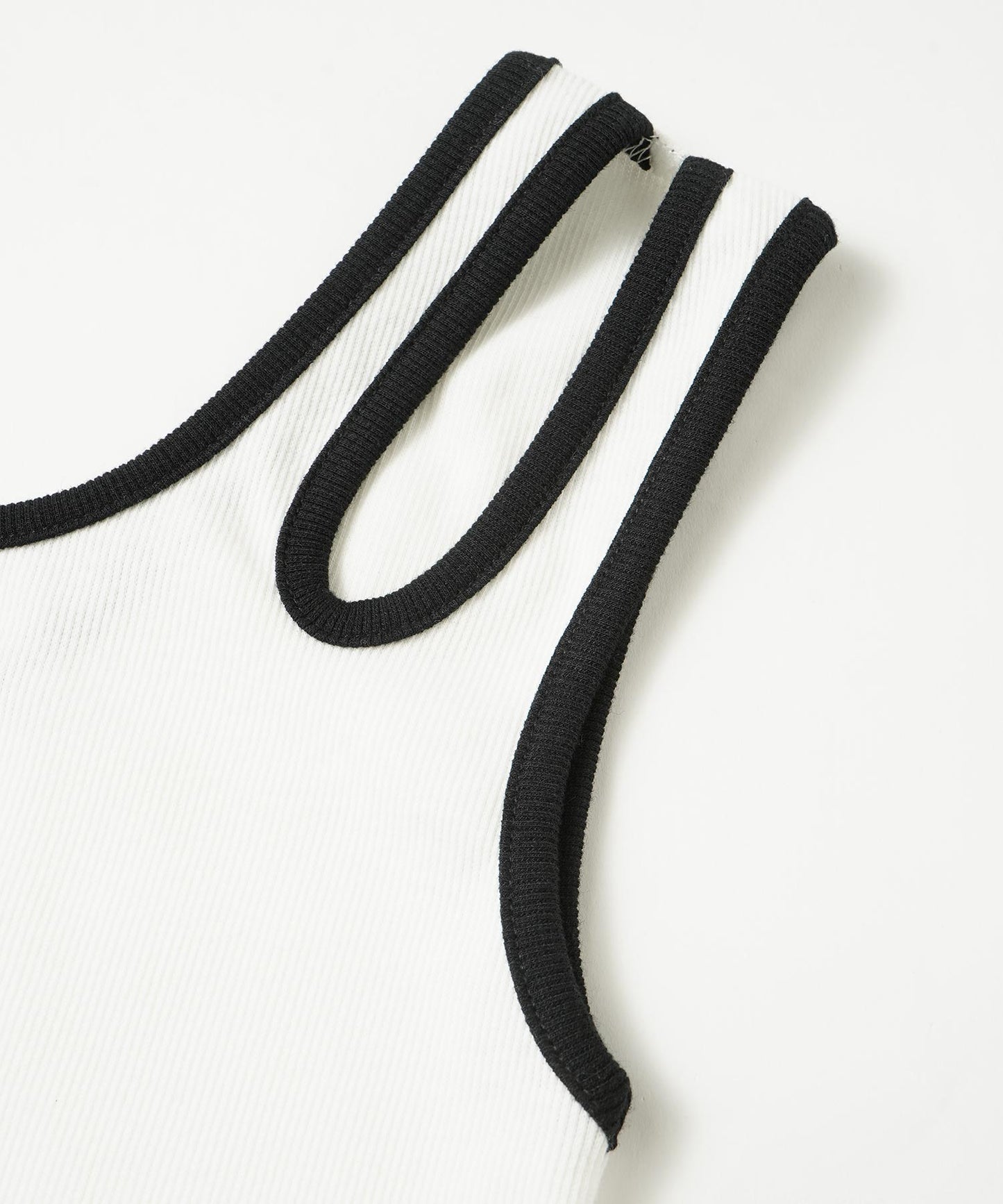 ASYMMETRICAL TANK TOP