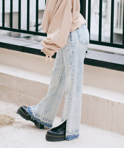 CHEMICAL WASH SIDE SLIT FLARED DENIM PANTS