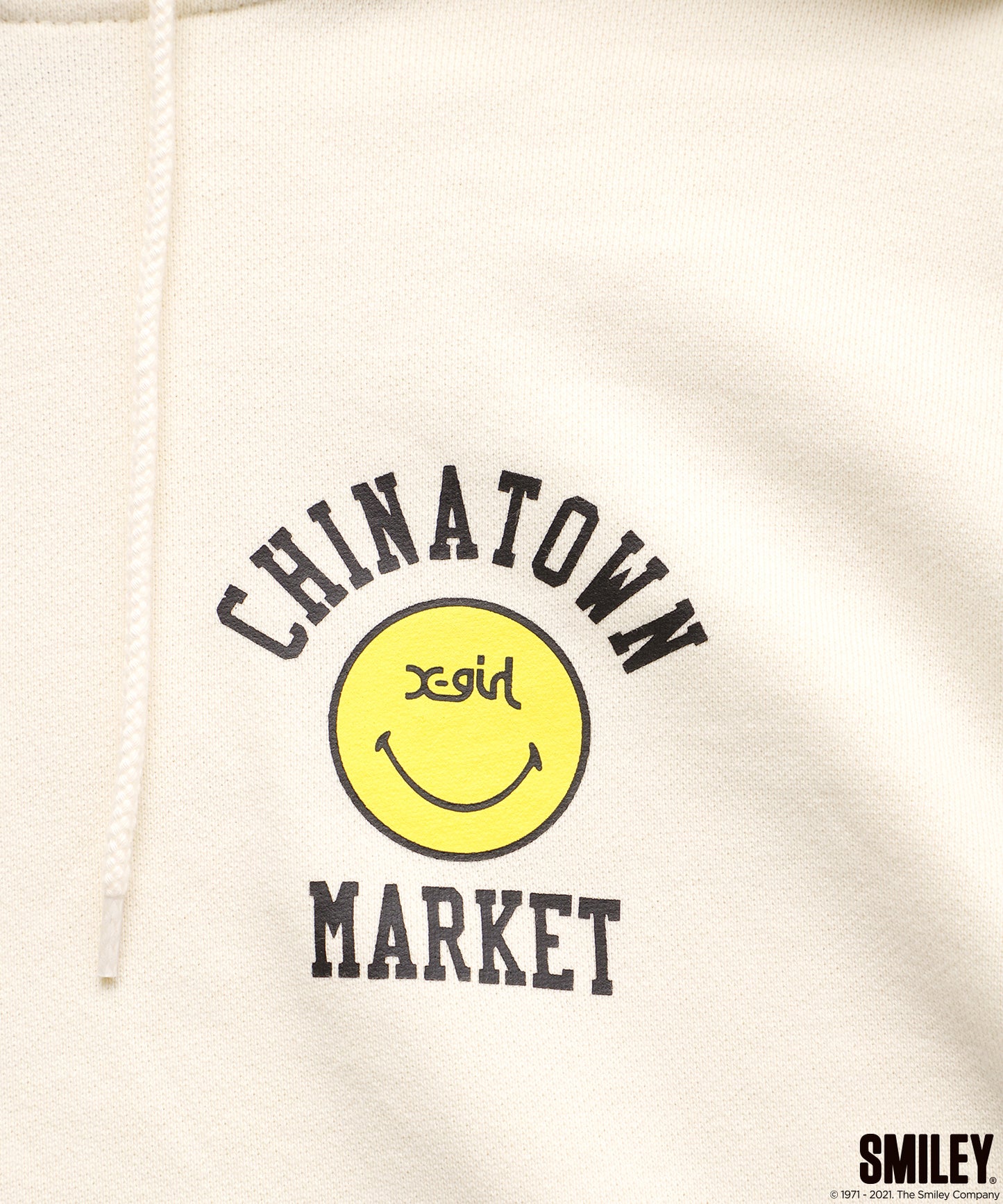 X-girl × CHINATOWN MARKET WINKY SWEAT HOODIE