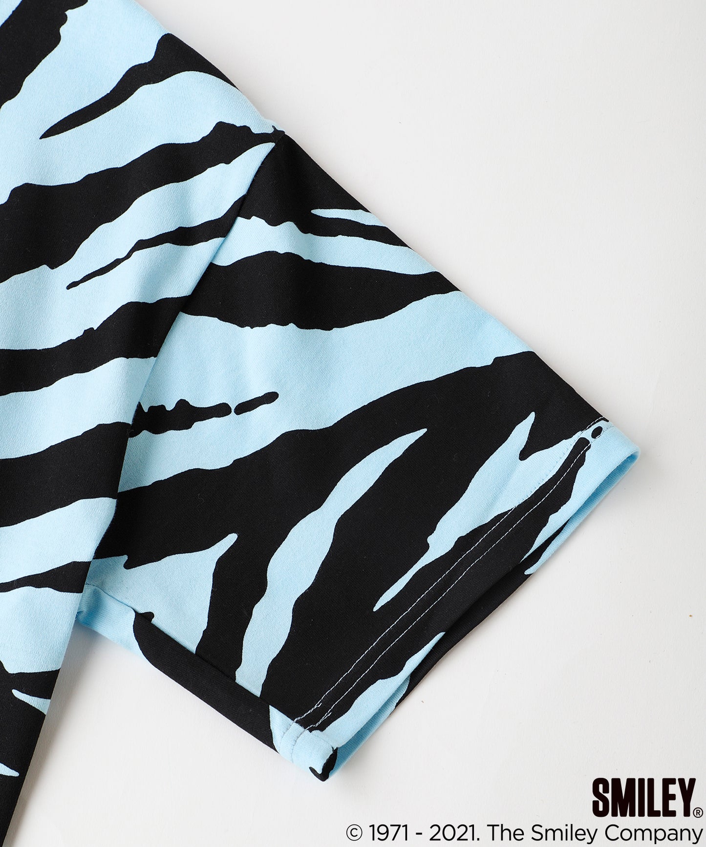 X-girl × CHINATOWN MARKET WINKY FACE S/S TEE